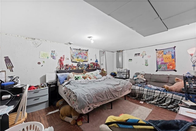 bedroom featuring dark hardwood / wood-style floors