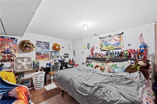 bedroom featuring hardwood / wood-style flooring