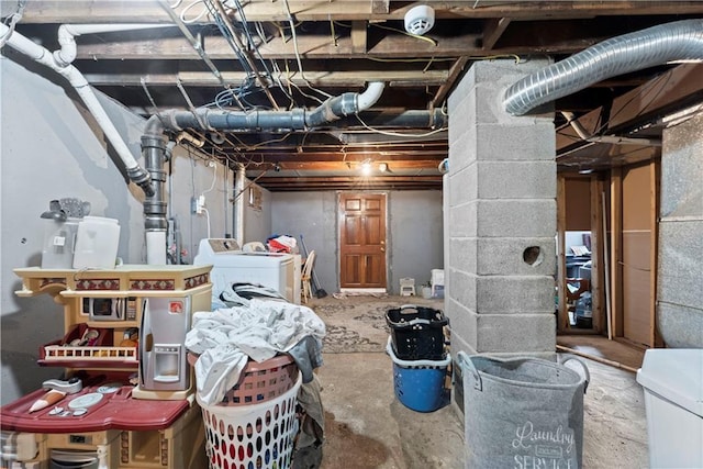 basement with washer and dryer