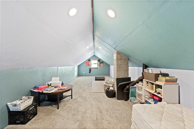 game room featuring vaulted ceiling and carpet