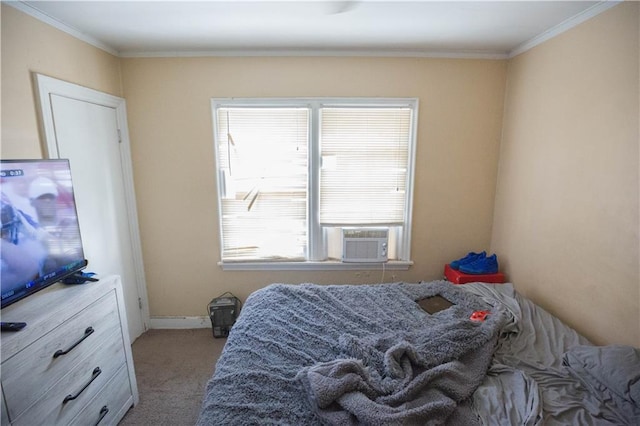 carpeted bedroom featuring baseboards, ornamental molding, and cooling unit