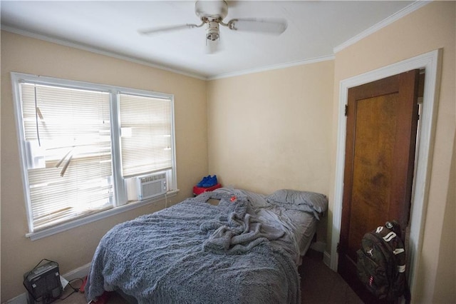 bedroom featuring ceiling fan, ornamental molding, and cooling unit