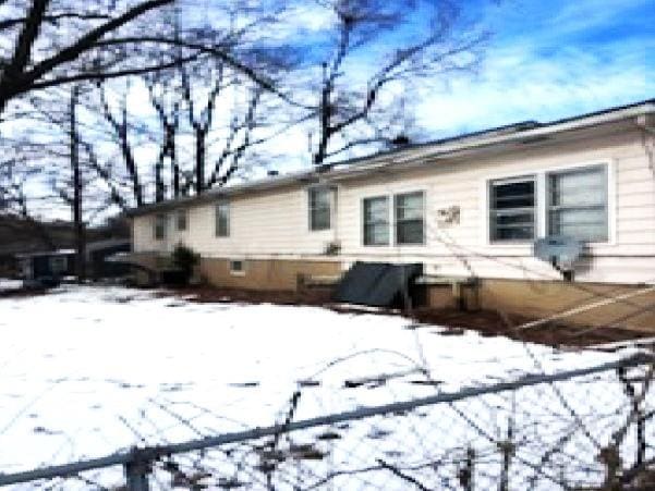 view of snow covered property