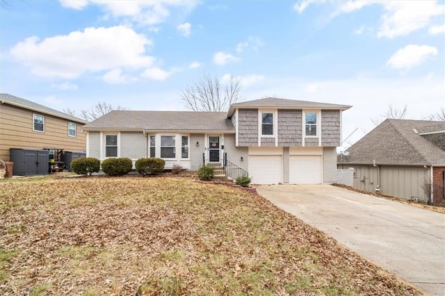 split level home featuring a garage