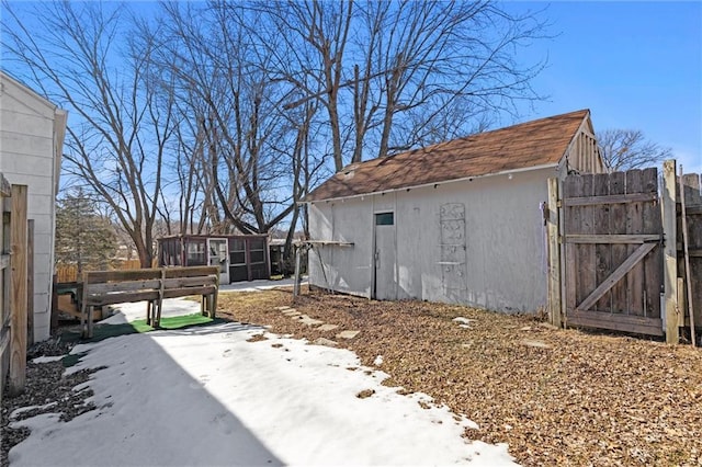 yard covered in snow with a patio