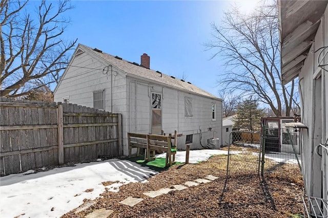 view of snow covered property