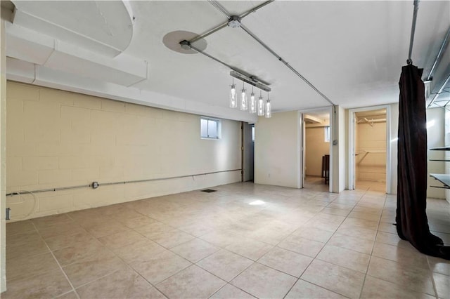 basement with light tile patterned floors