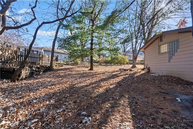 view of yard with a deck