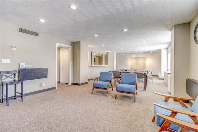 interior space featuring a textured ceiling