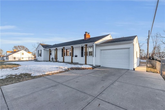 single story home featuring a garage