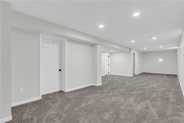 basement with dark carpet