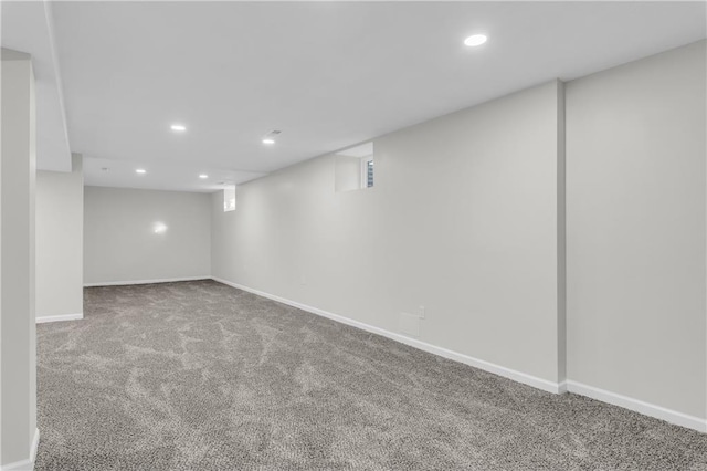 basement featuring carpet flooring