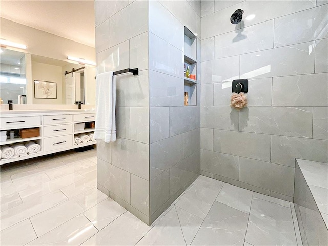 bathroom with vanity and walk in shower