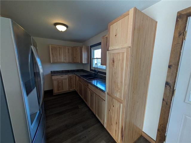 kitchen with sink, stainless steel fridge, dark hardwood / wood-style floors, and light brown cabinets