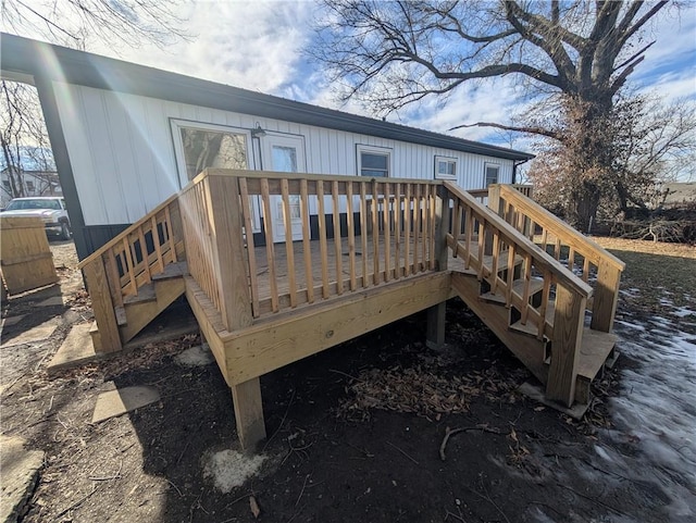 rear view of property with a wooden deck