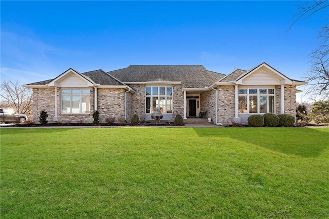 view of front of home with a front yard