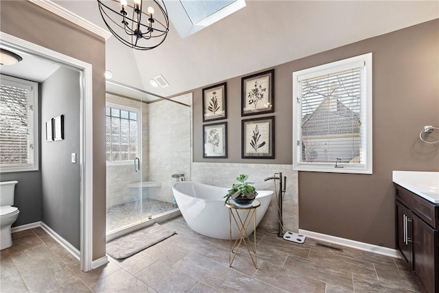 full bathroom with toilet, lofted ceiling with skylight, tile walls, vanity, and plus walk in shower