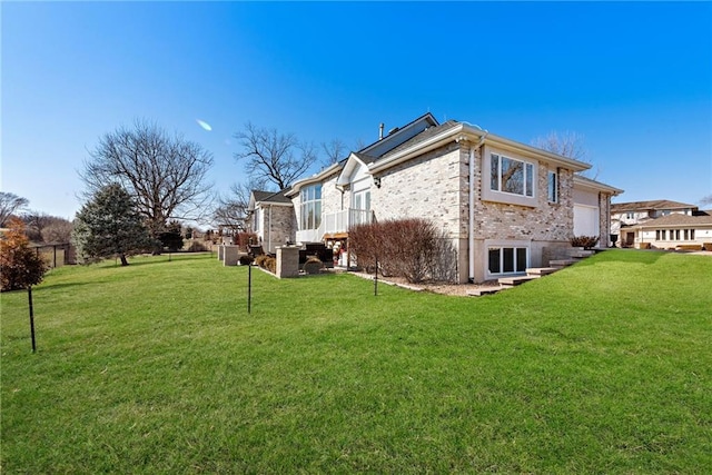 view of home's exterior with a garage and a yard