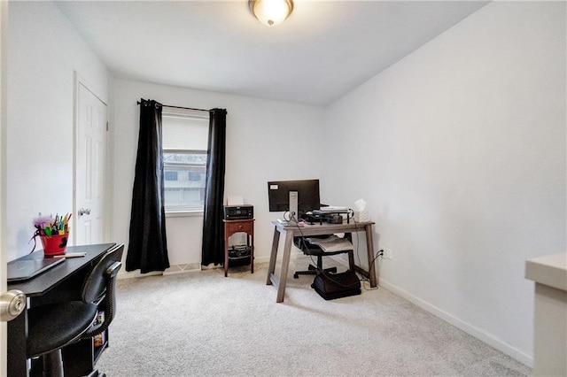 office area with light colored carpet