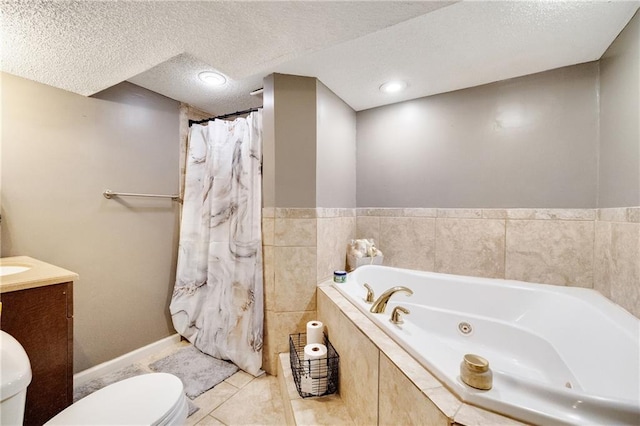 bathroom with toilet, a textured ceiling, vanity, a relaxing tiled tub, and tile patterned flooring