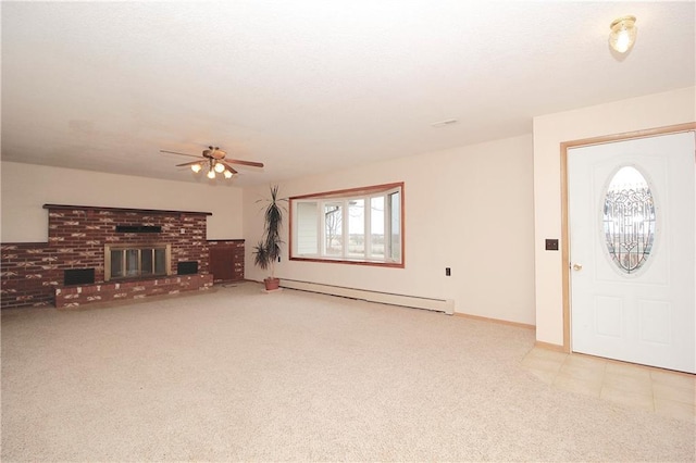 unfurnished living room with a baseboard heating unit, a fireplace, a ceiling fan, and light colored carpet
