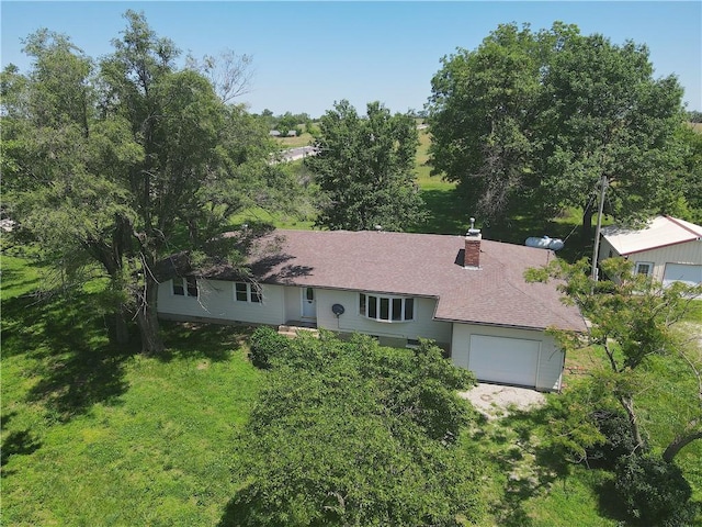 16702 S 59th Hwy, Welda, KS 66091 - view of front facade with a chimney, an attached garage, and roof with shingles