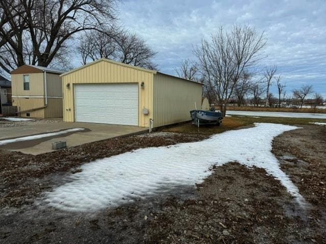 view of snow covered garage