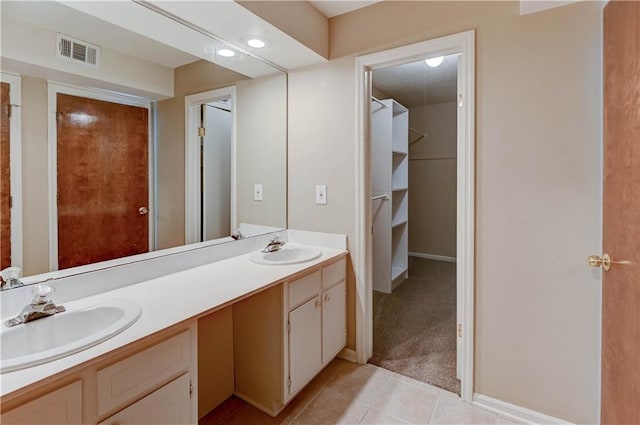 bathroom featuring vanity and tile patterned floors