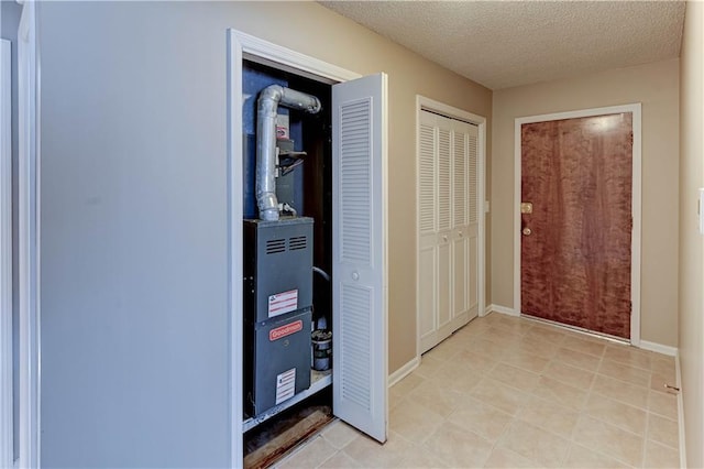 interior space featuring a textured ceiling