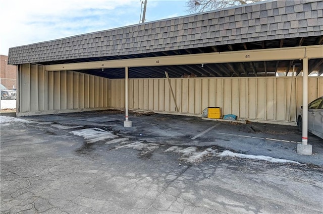 view of parking featuring a carport