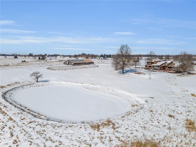 view of yard covered in snow