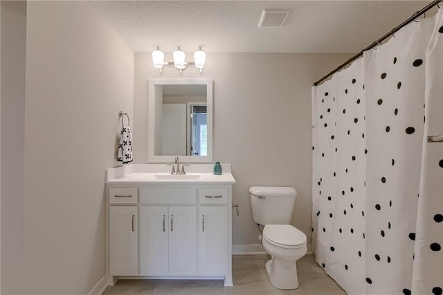 bathroom with hardwood / wood-style floors, curtained shower, vanity, toilet, and a textured ceiling