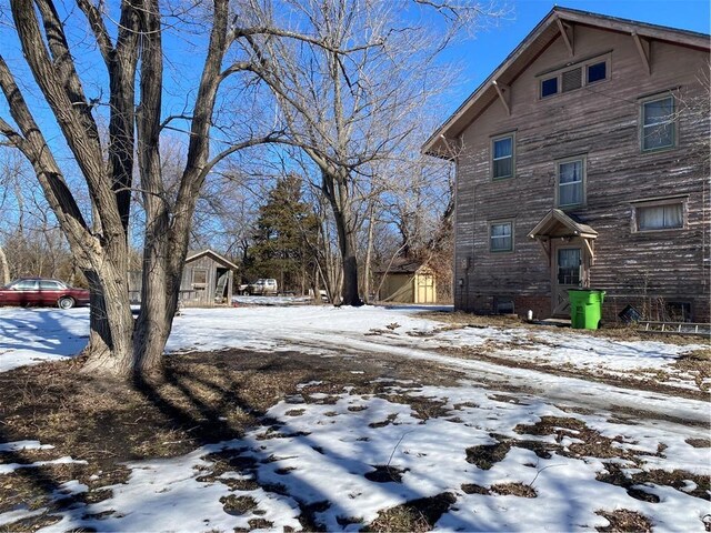 view of snow covered property