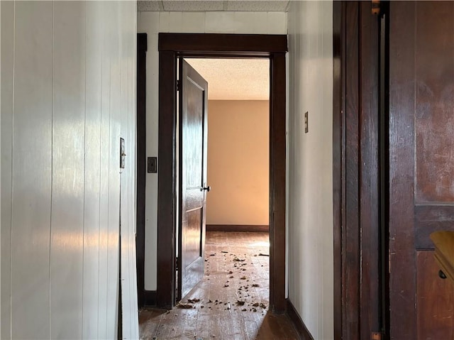 305 E 8th St, Wellsville, KS 66092 - hall featuring a textured ceiling
