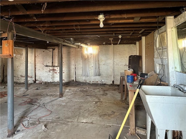 305 E 8th St, Wellsville, KS 66092 - unfinished basement with a sink