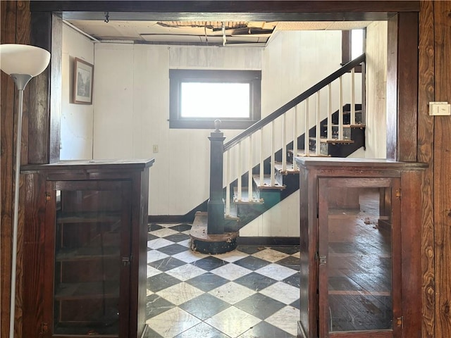 305 E 8th St, Wellsville, KS 66092 - entrance foyer with tile patterned floors, baseboards, and stairs