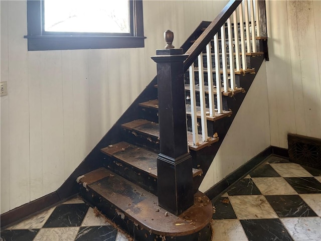 305 E 8th St, Wellsville, KS 66092 - stairway featuring wood walls and baseboards