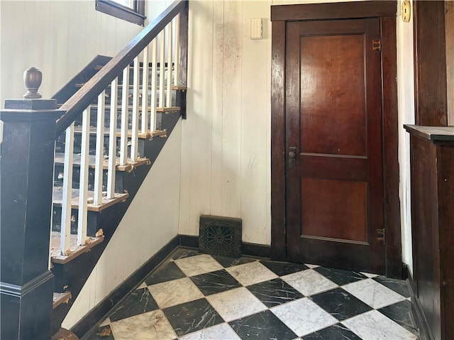 305 E 8th St, Wellsville, KS 66092 - staircase featuring baseboards