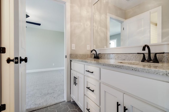 bathroom featuring vanity and tile patterned flooring