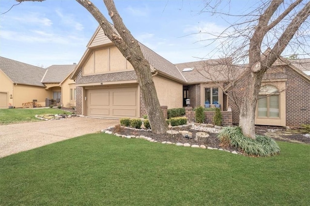 view of front of property with a garage and a front yard