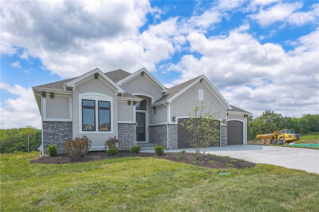 9000 N Clarion Ave, Kansas City, MO 64153 - view of front facade with an attached garage, stucco siding, concrete driveway, and a front yard
