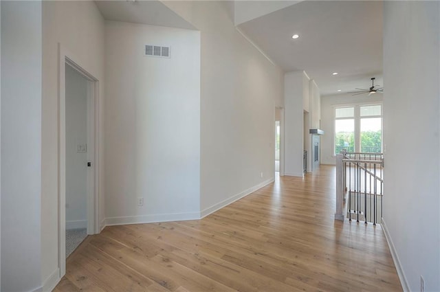 9000 N Clarion Ave, Kansas City, MO 64153 - corridor featuring light wood-style floors, baseboards, and recessed lighting