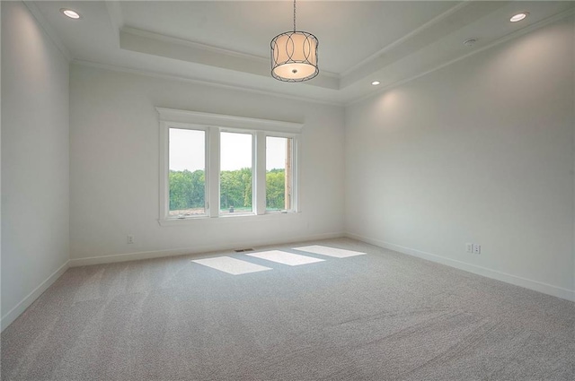 9000 N Clarion Ave, Kansas City, MO 64153 - empty room featuring crown molding, a tray ceiling, carpet floors, baseboards, and recessed lighting