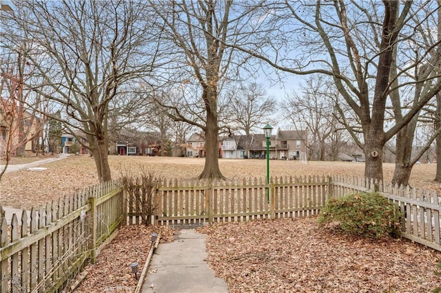 view of yard with fence