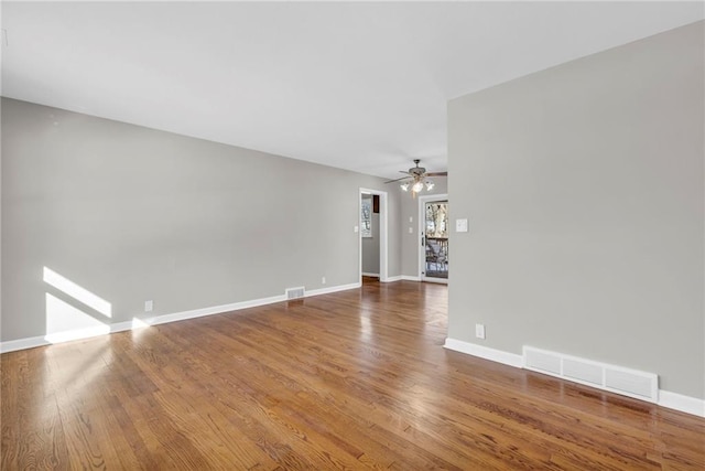 unfurnished living room with hardwood / wood-style floors and ceiling fan