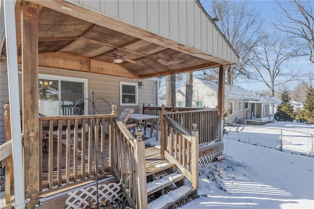 view of snow covered deck