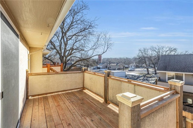 view of snow covered deck