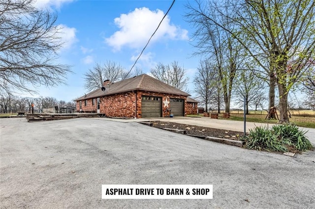 view of property exterior with a garage