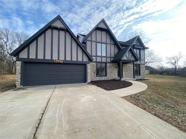 tudor home featuring a garage