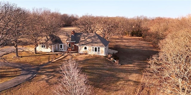 view of front of property with a rural view